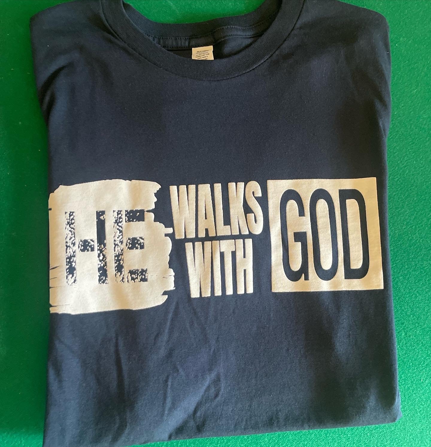 He walks with God tees