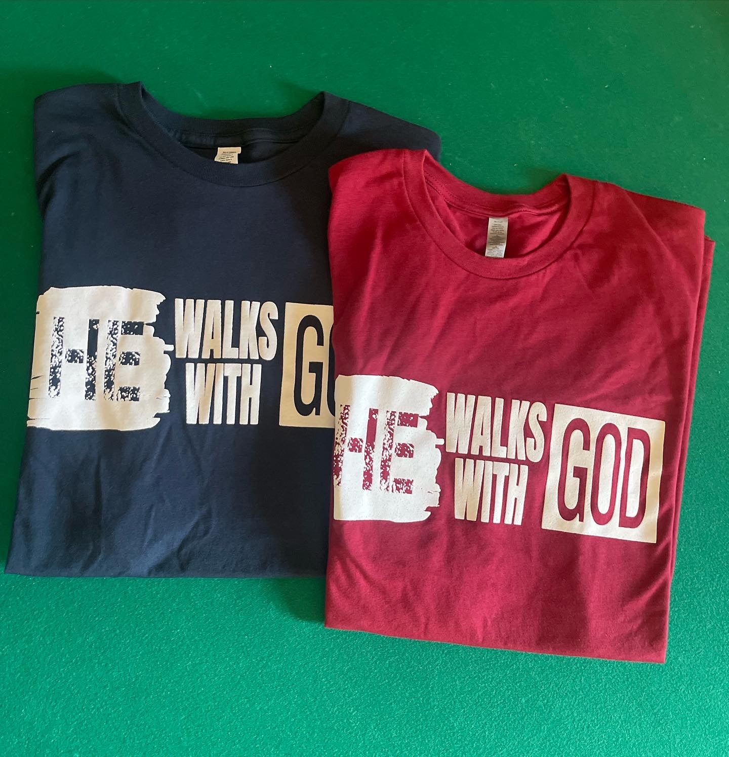 He walks with God tees